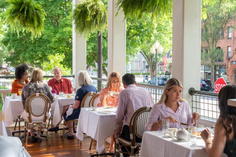 Breakfast on the hotel's front porch. Photo courtesy of Saratoga Arms Hotel.