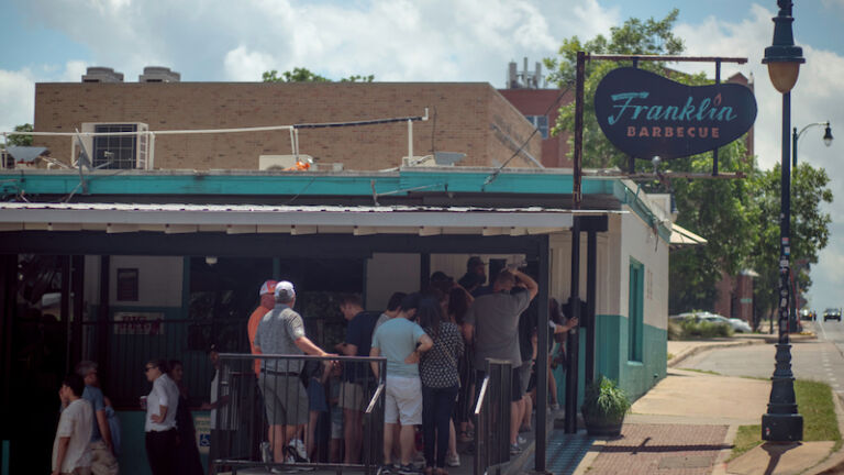 A line forms outside of Franklin Barbecue in Austin.