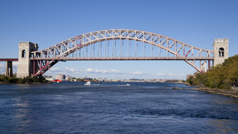 The Hell Gate Bridge is a railroad bridge between Astoria in the borough of Queens, Randall's/Wards Island, and The Bronx in New York City.