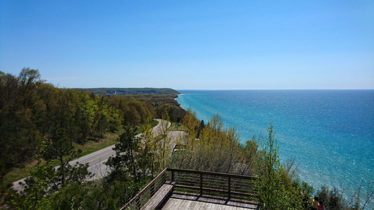 Inspiration Point, Michigan, USA - May 14, 2017: A warm summer afternoon at Western Michigan highway M-22 facing Lake Michigan.