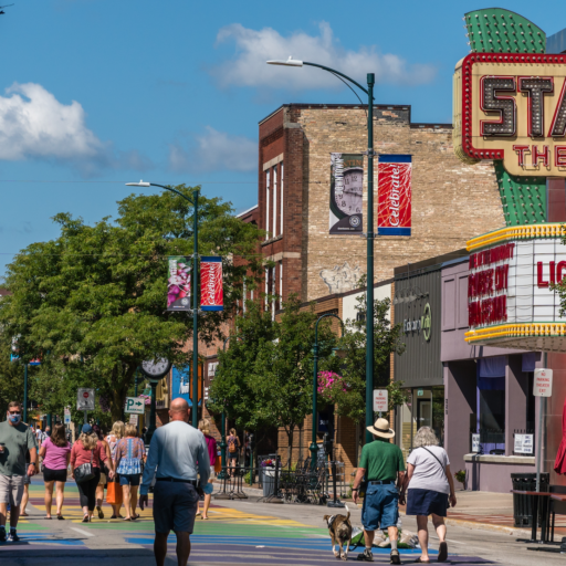 Traverse City, MI, US-August 16, 2020: Busy Front Street in downtown with State Street Theater.