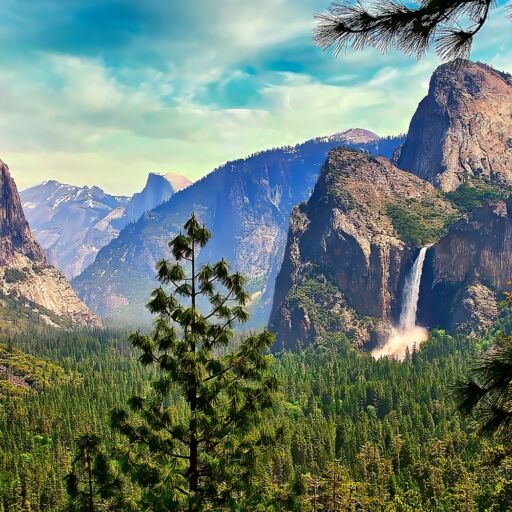 A panoramic view of the iconic Yosemite Valley in the Springtime, showing Bridalveil Falls and El Capitan.