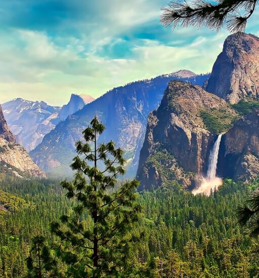 A panoramic view of the iconic Yosemite Valley in the Springtime, showing Bridalveil Falls and El Capitan.