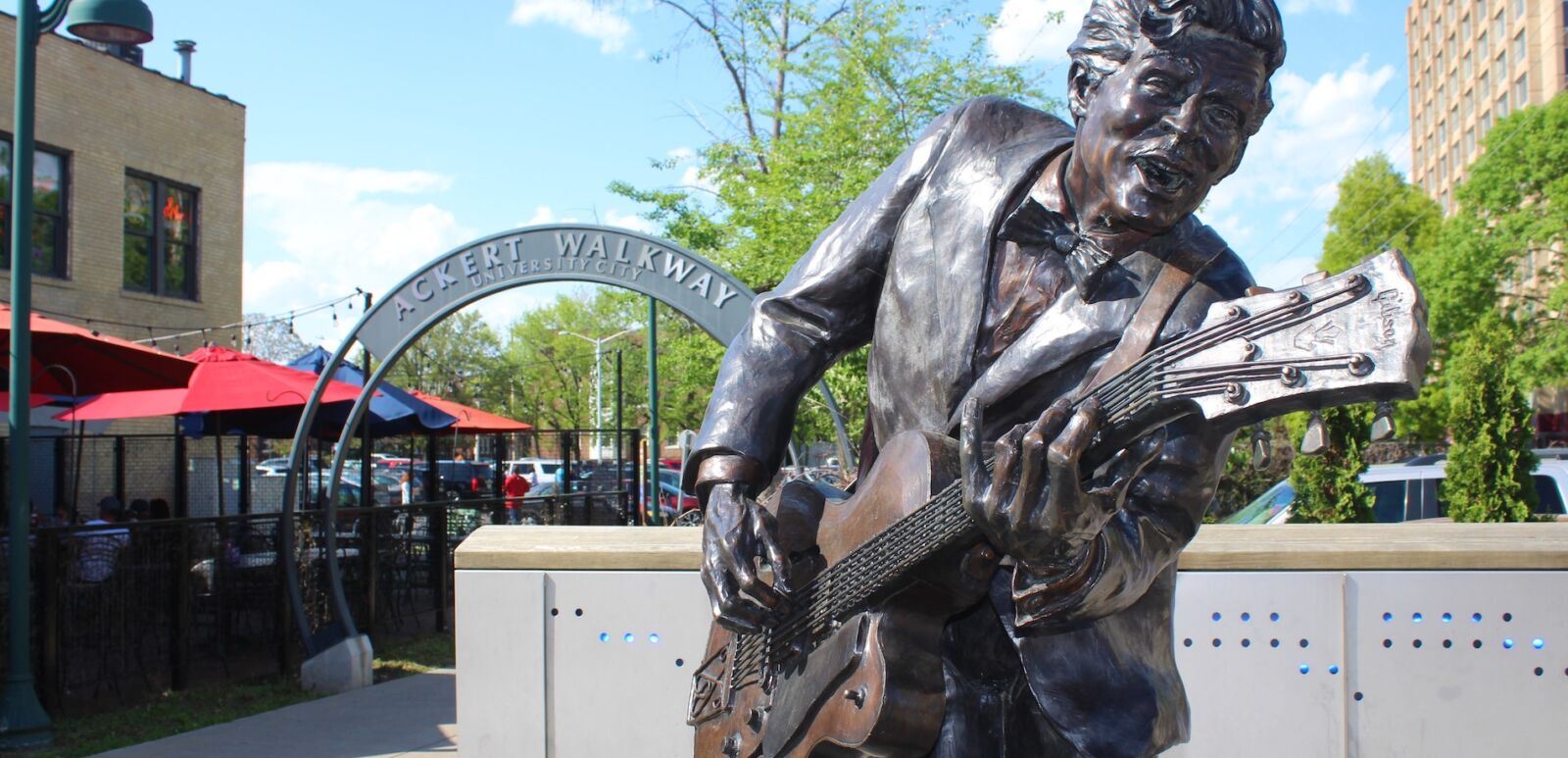 ST LOUIS MISSOURI - MAY 2018: Chuck Berry Statue in May 2018 in St. Louis, Missouri. The 8-foot-tall bronze statue stands on Delmar Blvd near the Ackert Walkway. Chuck Berry was born in St. Louis.